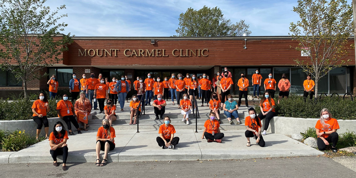 Mount Carmel Clinic team on orange shirt day 2021